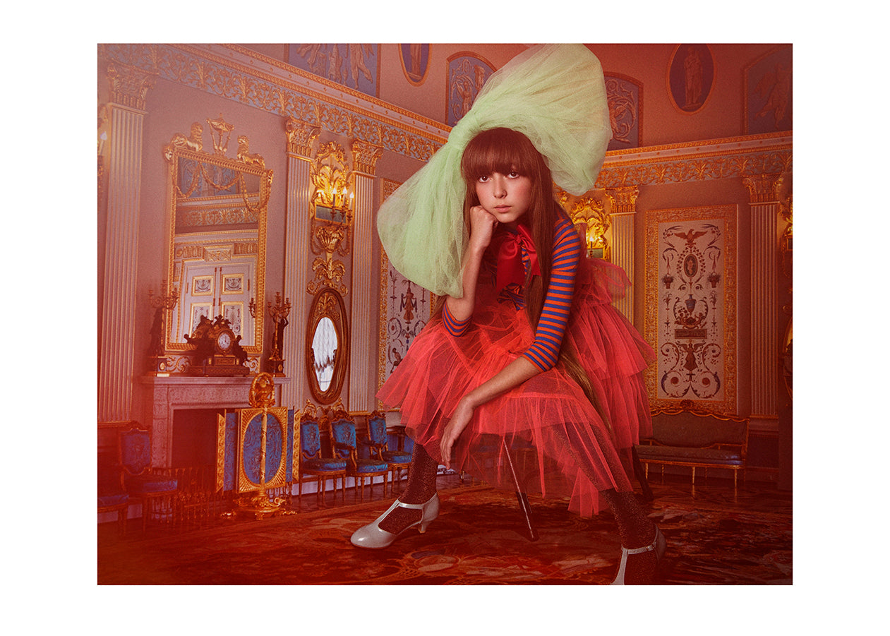 Dockhuset - Flicka med rosett